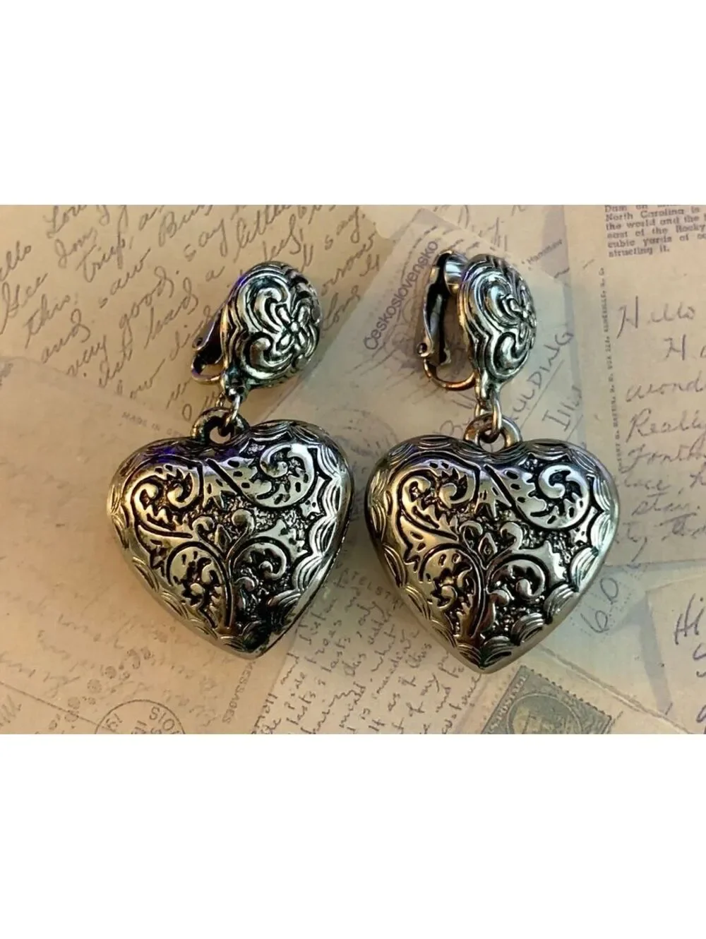 Vintage Signed Avon Puffy Heart Elegant Clip-On Earrings with Intricate Filigree